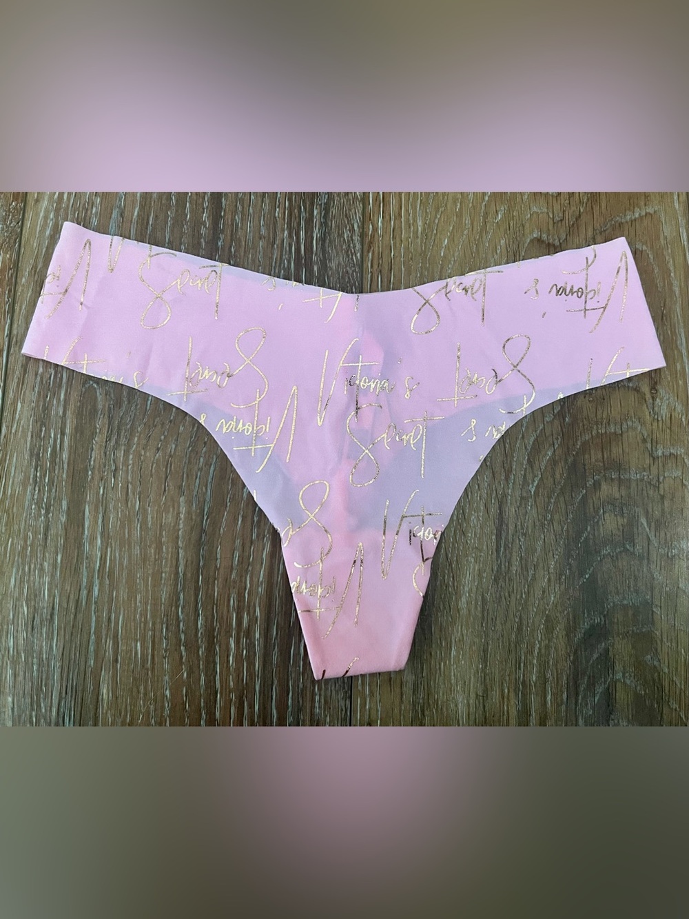 Victoria’s Secret No Show Thong Pink with Gold VS All Over Print Size Medium